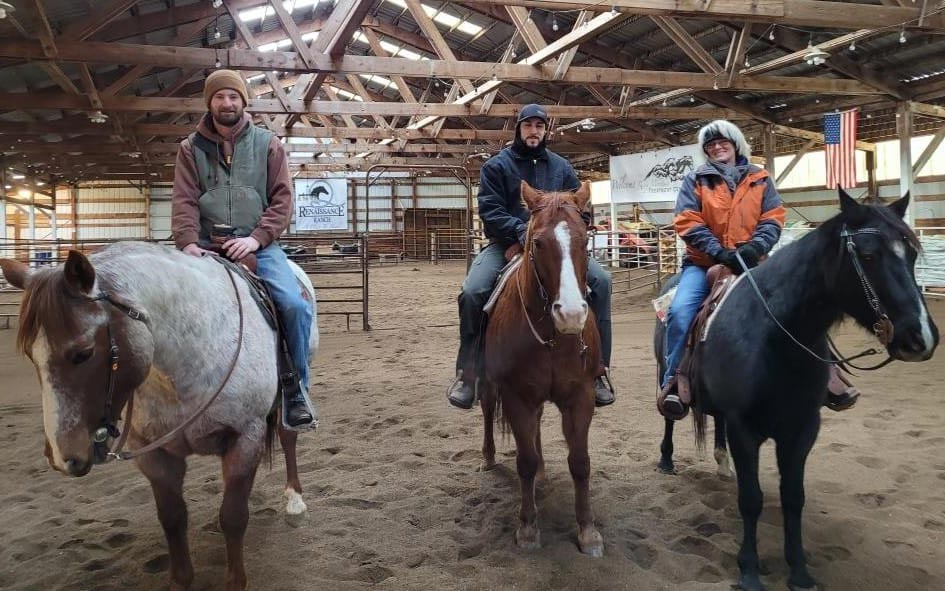 equine-therapy-54 3 People sitting on horses smiling for the camera