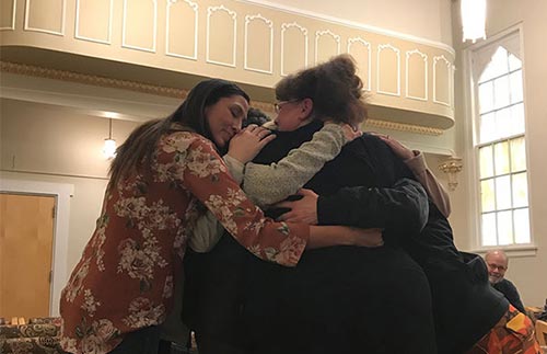 family-focused 3 Women Hugging and supporting each other